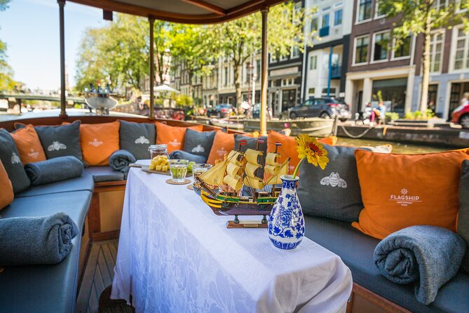 Amsterdam Canal Cruise in Classic Salon Boat With Drinks and Cheese - The Step Into the Boat: What You Should Know Before You Board