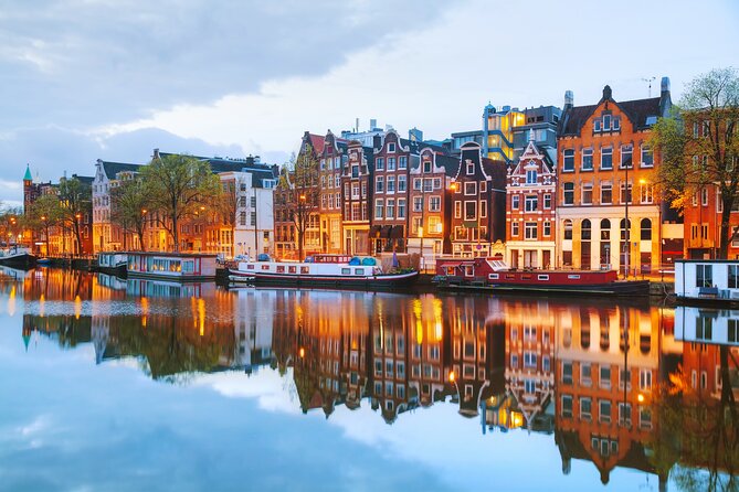 Amsterdam Canal Cruise in Classic Salon Boat With Drinks and Cheese - Cruising Amsterdam Water-Level: What You’ll See and How to Enjoy It