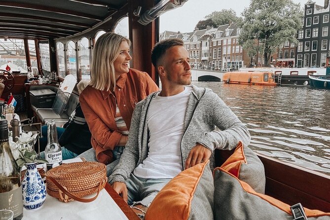 Amsterdam Canal Cruise in Classic Salon Boat With Drinks and Cheese - Choosing the Right Time: When Night Cruises Feel Extra Special