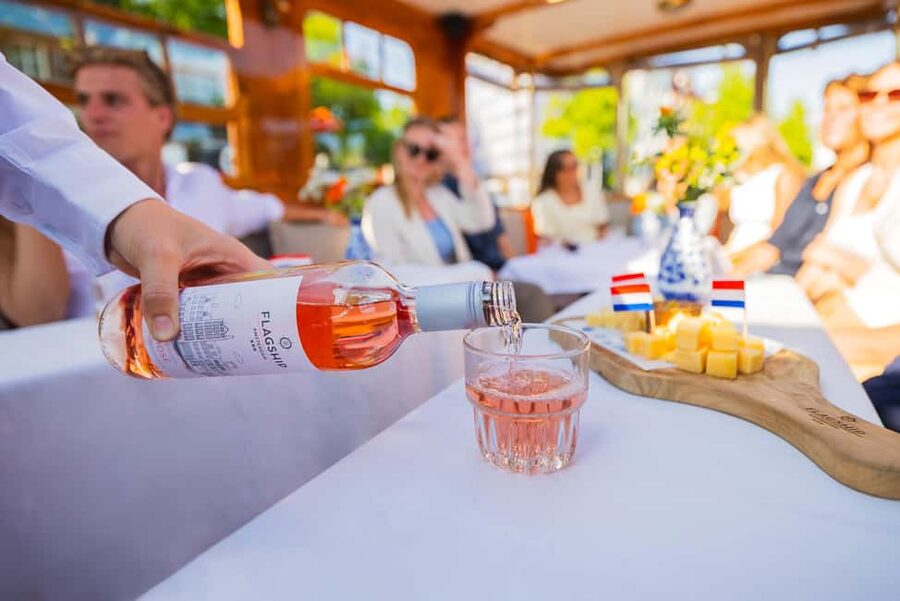 Amsterdam: Classic Saloon Boat Cruise with Cheese & Wine - Skinny Bridge, Jordaan, and the Red Light District From the Water