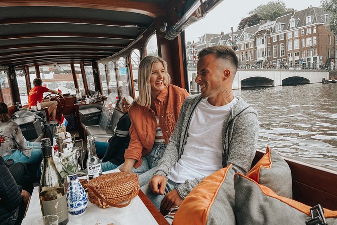 Amsterdam Classic Saloon Boat Cruise with Drinks and Cheese - How to hear the guide (and not miss the good parts)