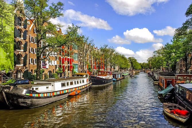 Amsterdam Day Trip from Brussels With Cheese, Clogs and Windmills - Optional 75-minute canal cruise: the fastest way to understand Amsterdam
