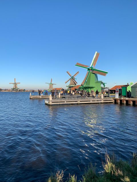 Amsterdam: Guided Zaanse Schans, Windmills & Cheese Tour - Optional Amsterdam canal cruise voucher: a calm finish in the city