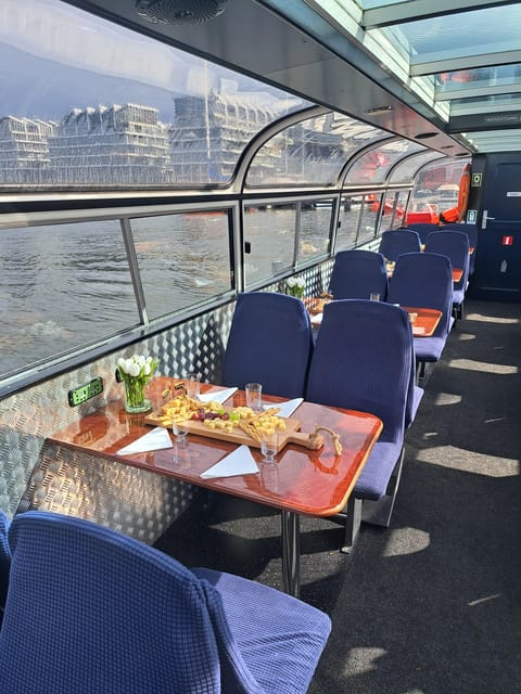 Amsterdam: Luxury Cheese & Wine Canal Cruise - The Cruise Experience: A Traditional Boat Through Iconic Canals