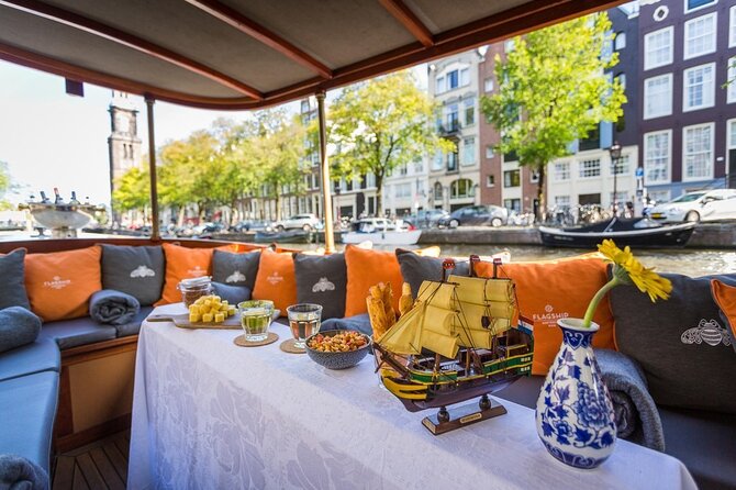 Amsterdam Small-Group Bike Tour With Canal Cruise, Drinks, Cheese - Drinks, cheese, and the fine print of onboard expectations