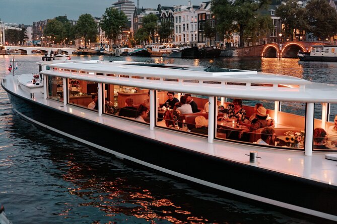 Amsterdam Small-Group Evening Canal Cruise Including Wine, Craft Beer, Cheese - A 90-minute canal loop with the best kind of Amsterdam attitude
