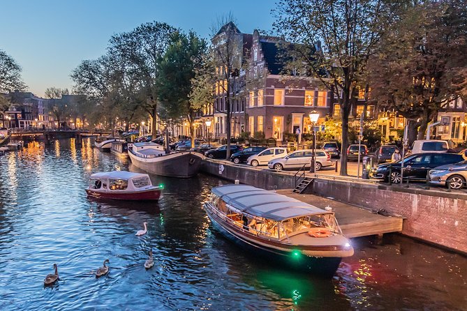 Amsterdam Small-Group Evening Canal Cruise Including Wine, Craft Beer, Cheese - Comfort on board: blankets, pillows, and a quiet motor