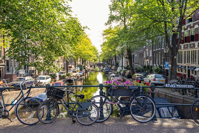 Amsterdam Walking Tour and Cruise with Drinks and Cheese Tasting - Nieuwmarkt and San Anton Gate: markets as a city engine