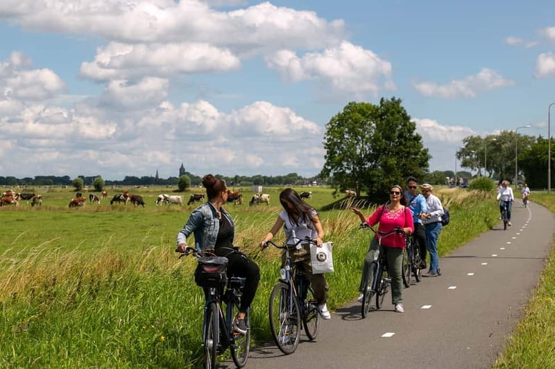 Amsterdam: Windmill, Cheese, and Countryside E-Bike Tour - Getting Out of Amsterdam: Ferry Ride, Old-Holland Views, and Fast Start