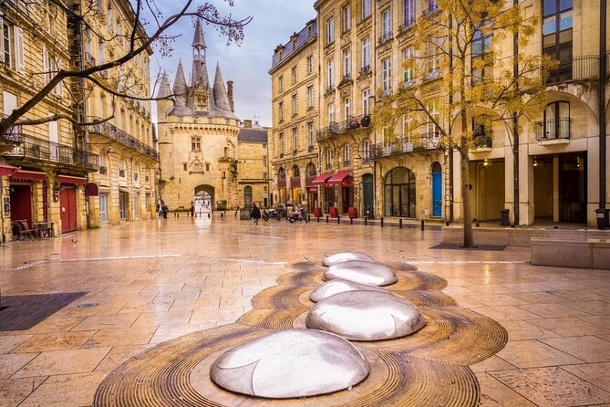 Bordeaux Night Walk Ending with Delicious wine & cheese Tasting - Porte Cailhau: The Time-Travel Gate and the Camino Connection