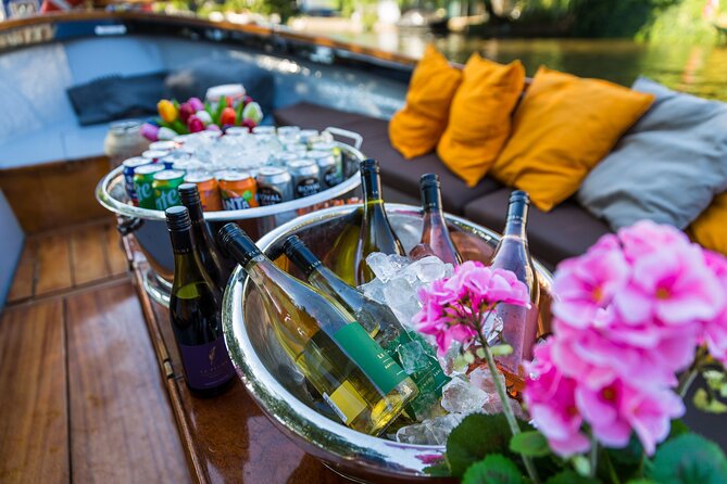 Classic Salonboat Tour in Amsterdam Including Cheese and Wine - Leidseplein, theater districts, and the Amstel’s performance belt