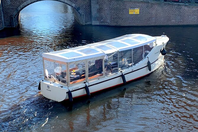 Dutch Cheese & Drinks Guided Amsterdam Boat Tour, All Inclusive - Medieval narrow canals and the monks-and-merchants vibe