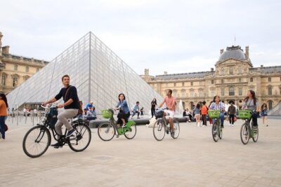 First Day Bike Tour, Top Sights, hidden gems, Wine&Cheese picnic - Champs-Élysées, Grand Palais, and Pont Alexandre III in one smooth sweep