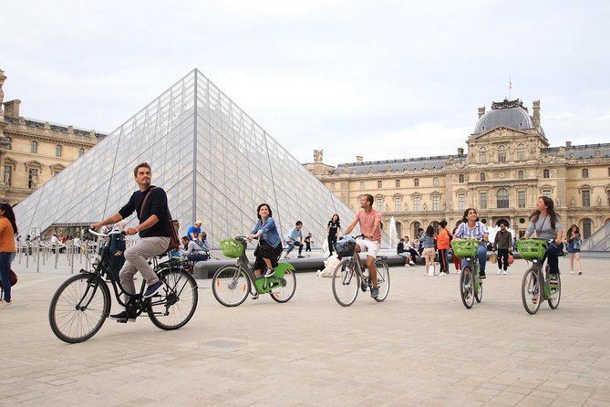 First Day Bike Tour, Top Sights, hidden gems, Wine&Cheese picnic - Champs-Élysées, Grand Palais, and Pont Alexandre III in one smooth sweep