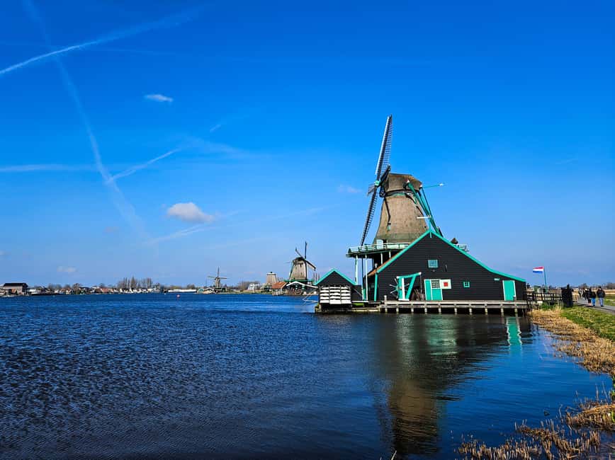 From Amsterdam: Volendam and Zaanse Schans Tour with Cheese - Zaanse Schans Windmill Village: Old Wooden Houses and Big-Scale Craft