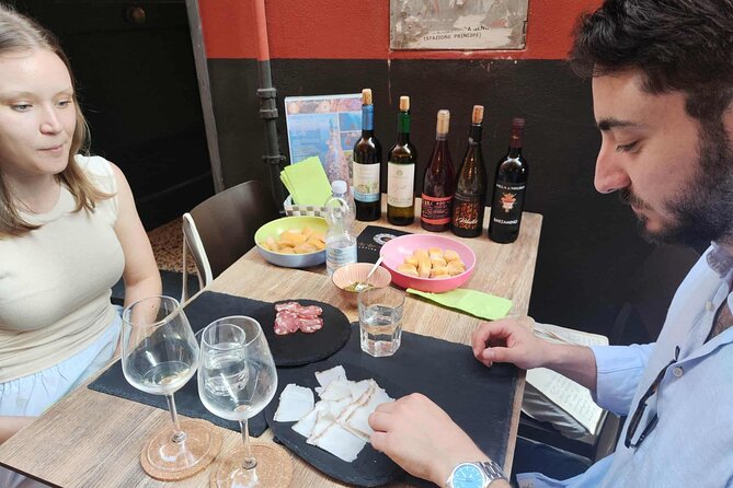 Genoa: 5 Ligurian Wines with Pesto, Focaccia & Cheese Tasting - Inside the family bottega near Christopher Columbus