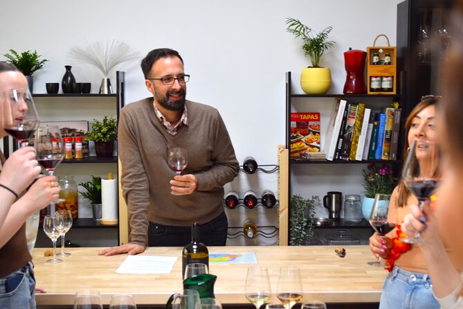 Gourmet Experience: Tasting of Spanish Cheese and Exclusive Wines - Atmosphere and group size: cozy, modern, and built for conversation