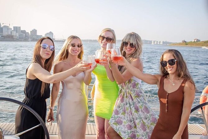 JFarwell Sunset Wine and Cheese Yacht Sailing - Helping with the sails: why it changes the whole experience