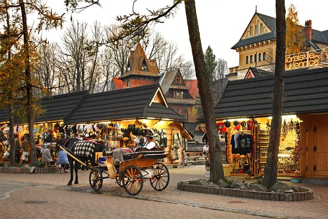 Krakow–Zakopane: Cable Car, Chocholow Baths, Cheese & Vodka - Chochołów: wooden village photos plus cheese-and-vodka fun