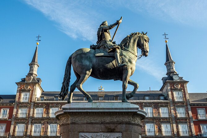 Madrid Bike Tour with Churros and Wine, Ham, and Cheese Upgrade - El Retiro Park Stops: Alfonso XII, Palacio de Cristal, and the Fallen Angel