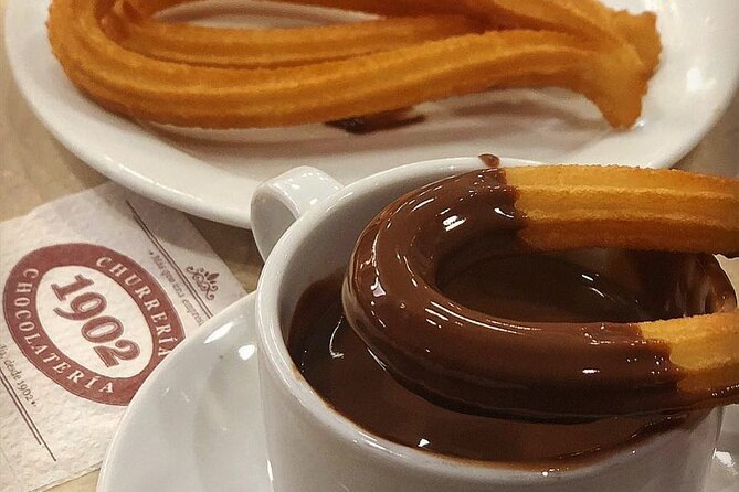 Madrid Bike Tour with Churros and Wine, Ham, and Cheese Upgrade - Getting Started at Cervecería 100 Montaditos: Helmet, Timing, and Fit