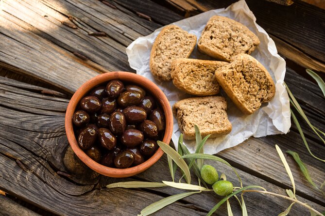 Naxos Mythology & Ancient Sites Tour with Cheese & Wine - Dionysus in Iria: sacred vines, olives, figs, and an older timeline
