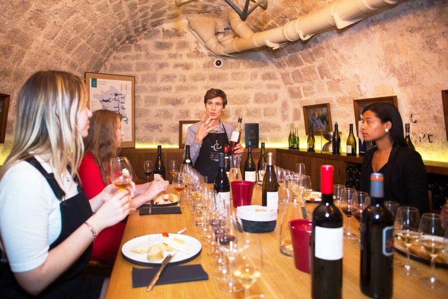 Paris: The Ultimate Wine and Cheese Tasting in English - Entering Les Caves du Louvre: the setting for a real tasting