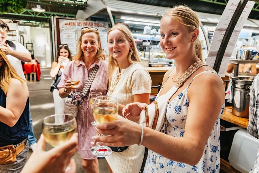 Paris: Walking Food Tour with Cheese, Wine and Delicacies - Off the Main Path: How the Traditional Market Stop Changes the Whole Experience