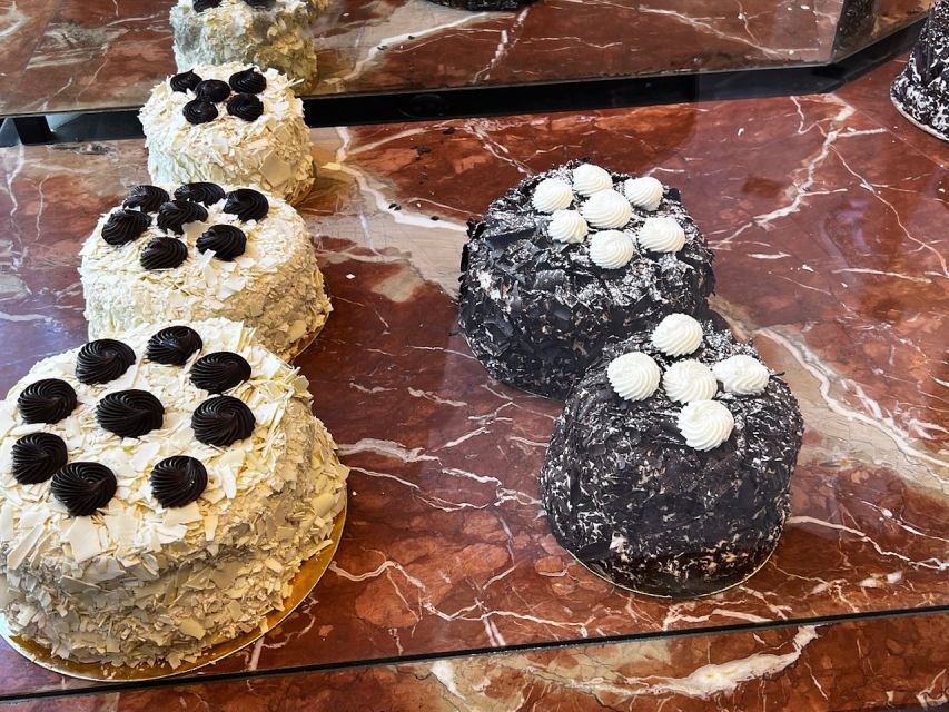 Paris: Walking Food Tour with Cheese, Wine and Delicacies - The Included Restaurant Stop: Why One Sit-Down Moment Helps You Enjoy It All
