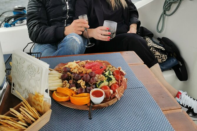 Porto: Wine and cheese tasting on a sailboat on the Douro River - Stop 1: Ribeira—first sips with the riverfront in view