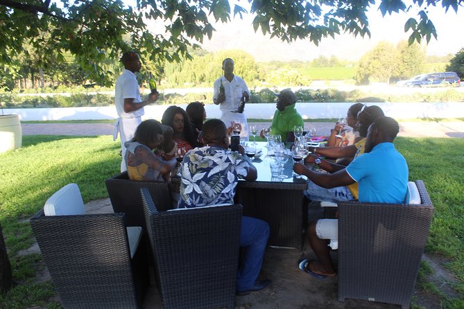 Shared Tour To The Wineries Stellenbosch Paarl + Cheese Tasting from Cape Town - Babylonstoren Farm and Its Garden Views From a Glass-Front Tasting Centre