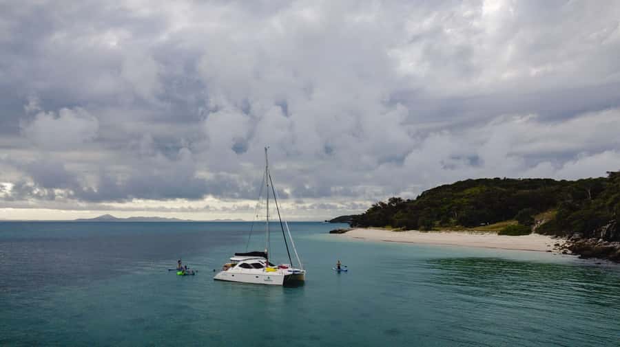 Yeppoon: Sunset Cruise w/ Cheese Platter & Champagne - Comfort on Deck: Lounge Time, Music, and Space to Move