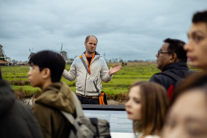 Zaanse Schans and Cheese Tasting Guided Tour from Amsterdam - Optional Amsterdam canal cruise voucher: add 19-language audio and classic canals