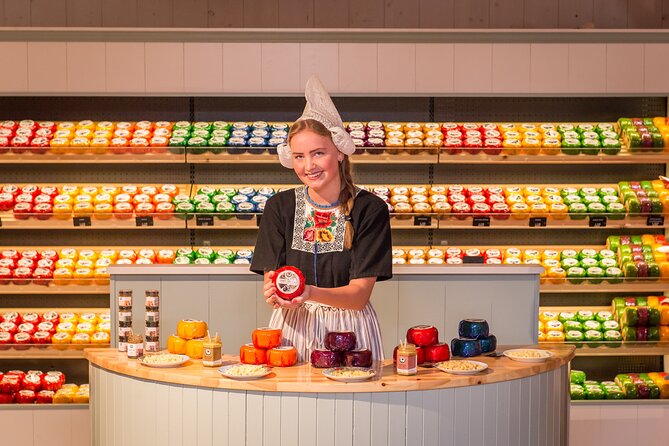 Zaanse Schans and Cheese Tasting Guided Tour from Amsterdam - Kooijman Souvenirs & Clogs: watching clogs made, then spending time with the craft