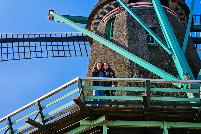 Zaanse Schans Windmills, Cheese and Volendam Tour from Amsterdam - Optional Amsterdam canal cruise voucher: convenient timing, not guaranteed audio perfection